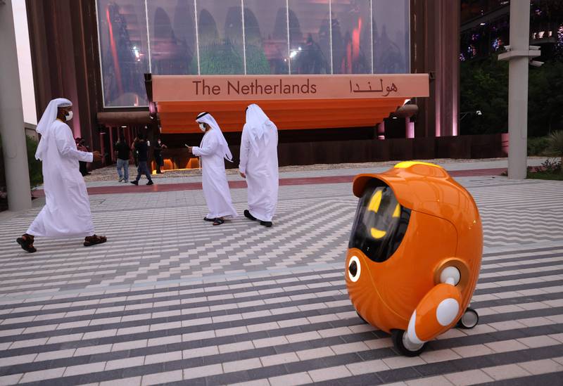 A robot outside the Dutch pavilion at the Expo 2020 Dubai. New districts are being built in the UAE, with artificial intelligence at their core. AFP